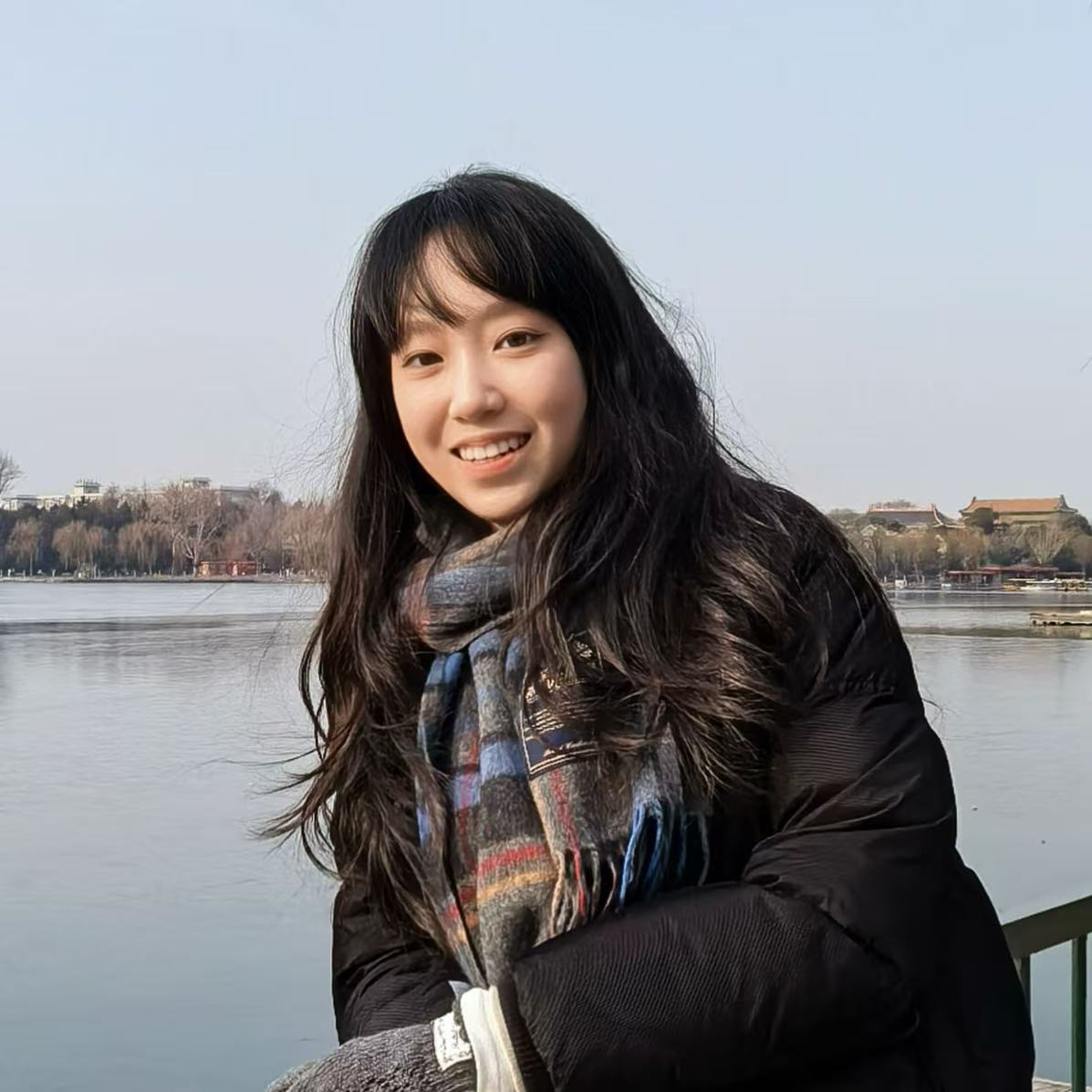 Linghui Shen by a lakeside
